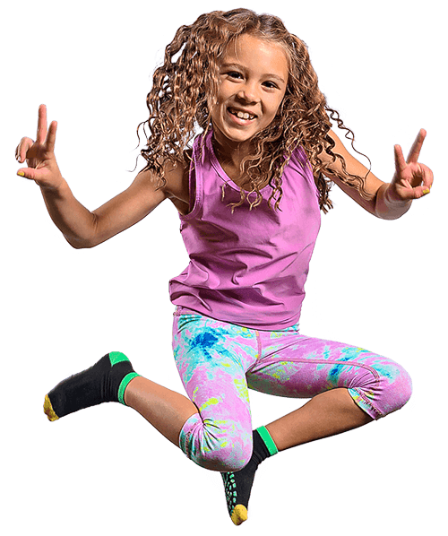 Little Girl Jumping at Trampoline Park